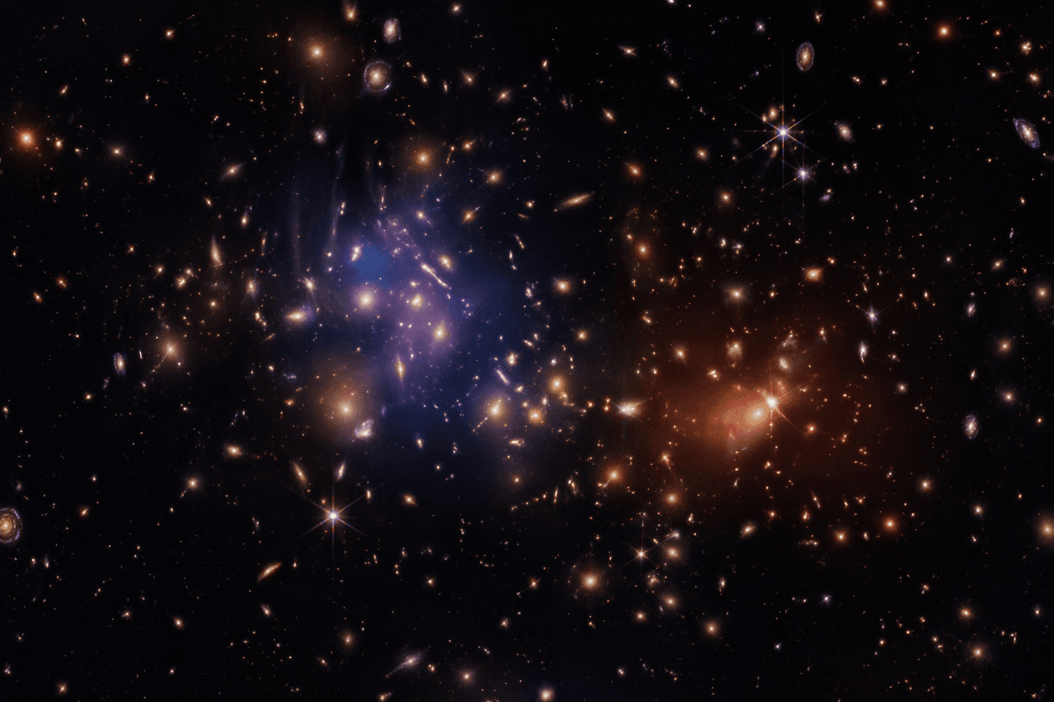 James Webb image reveals a galaxy cluster still merging in Columba